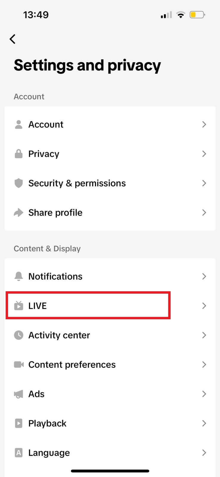 TikTok settings showing the LIVE option to configure live stream features